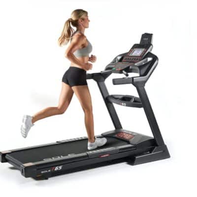 Sole F65 Folding Treadmill with a female model running