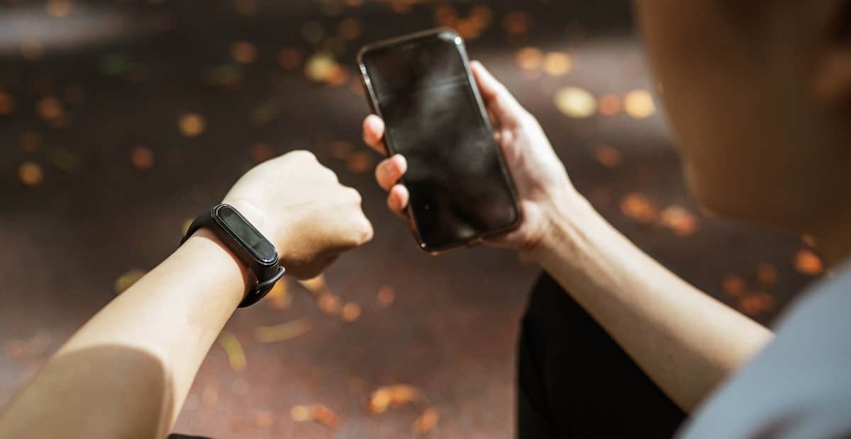 A woman using devices for health monitoring